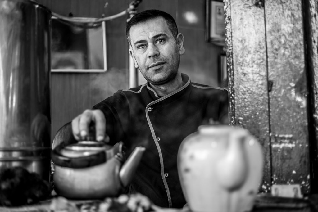 A tea / chai seller at the Bazaar in Sulaymaniyah, Iraq