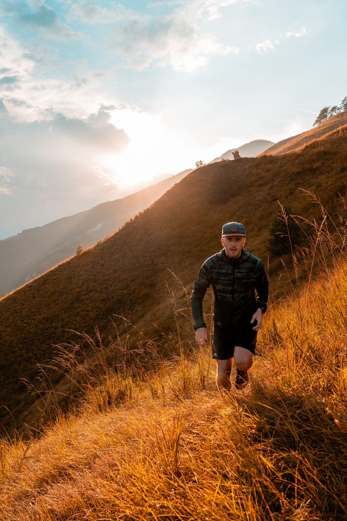 Kamniski vrh, Slovenia - September 2018: A man (photographer) running on top of Kamniski vrh.